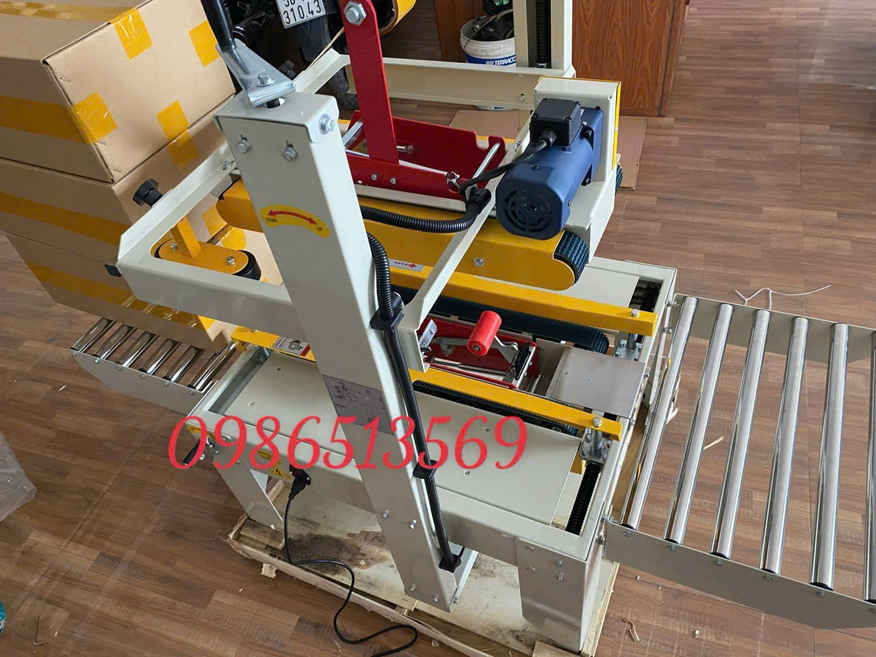 máy dán băng keo thùng hai may FX5060
