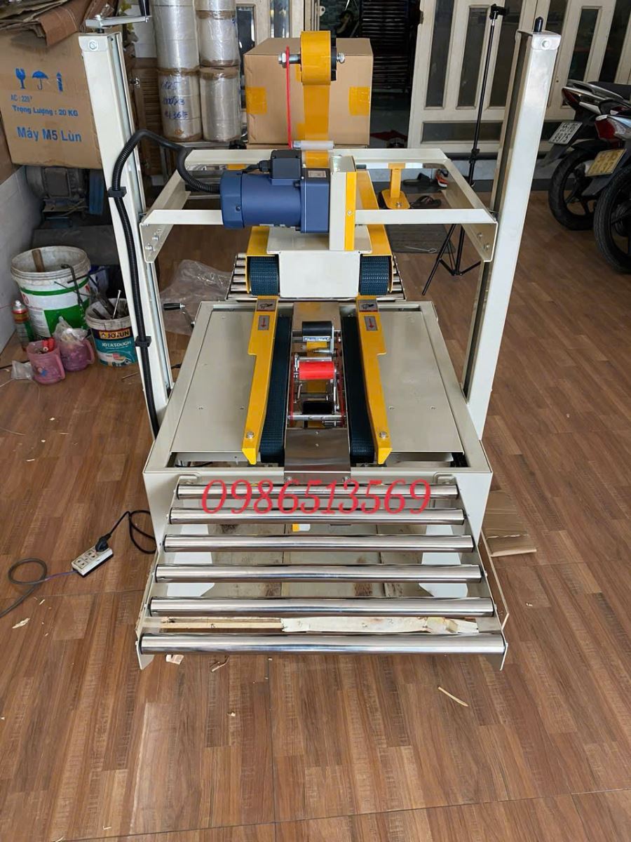 máy dán băng keo thùng hai may FX5060
